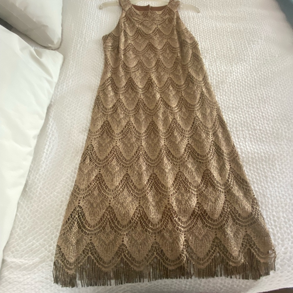 Cute gold island glam dress looks great on and so comfortable.